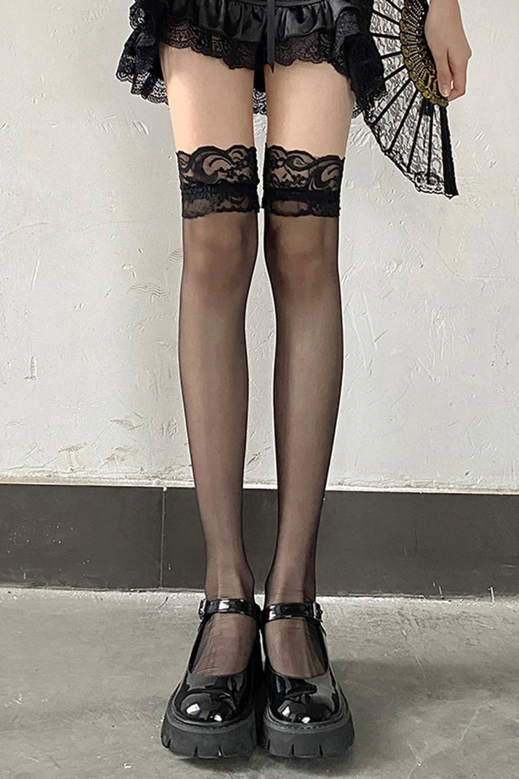 Designed for the daring and elegant, these black Gothic socks blend seduction with sophistication. The over-the-knee length and wide cuff create a striking silhouette, while intricate lace and fishnet detailing add texture and allure. Perfect for completing a bold Lolita or Gothic coord, these socks empower wearers to embrace their darkly romantic side. Crafted for both style and statement, they transform any outfit into a masterpiece of dramatic elegance.