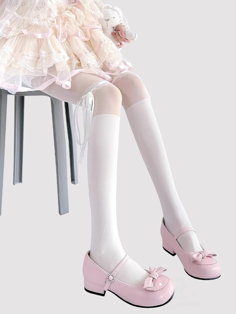 These Lolita-style tights are crafted in classic black and ivory, featuring delicate lace trims and charming bow accents. The sheer, ballet-inspired design adds a soft, elegant touch to any outfit, perfectly complementing Sweet Lolita dresses and skirts. Comfortable and lightweight, they are ideal for daily wear, tea parties, or special Lolita gatherings, enhancing the overall princess-like aesthetic of your ensemble.