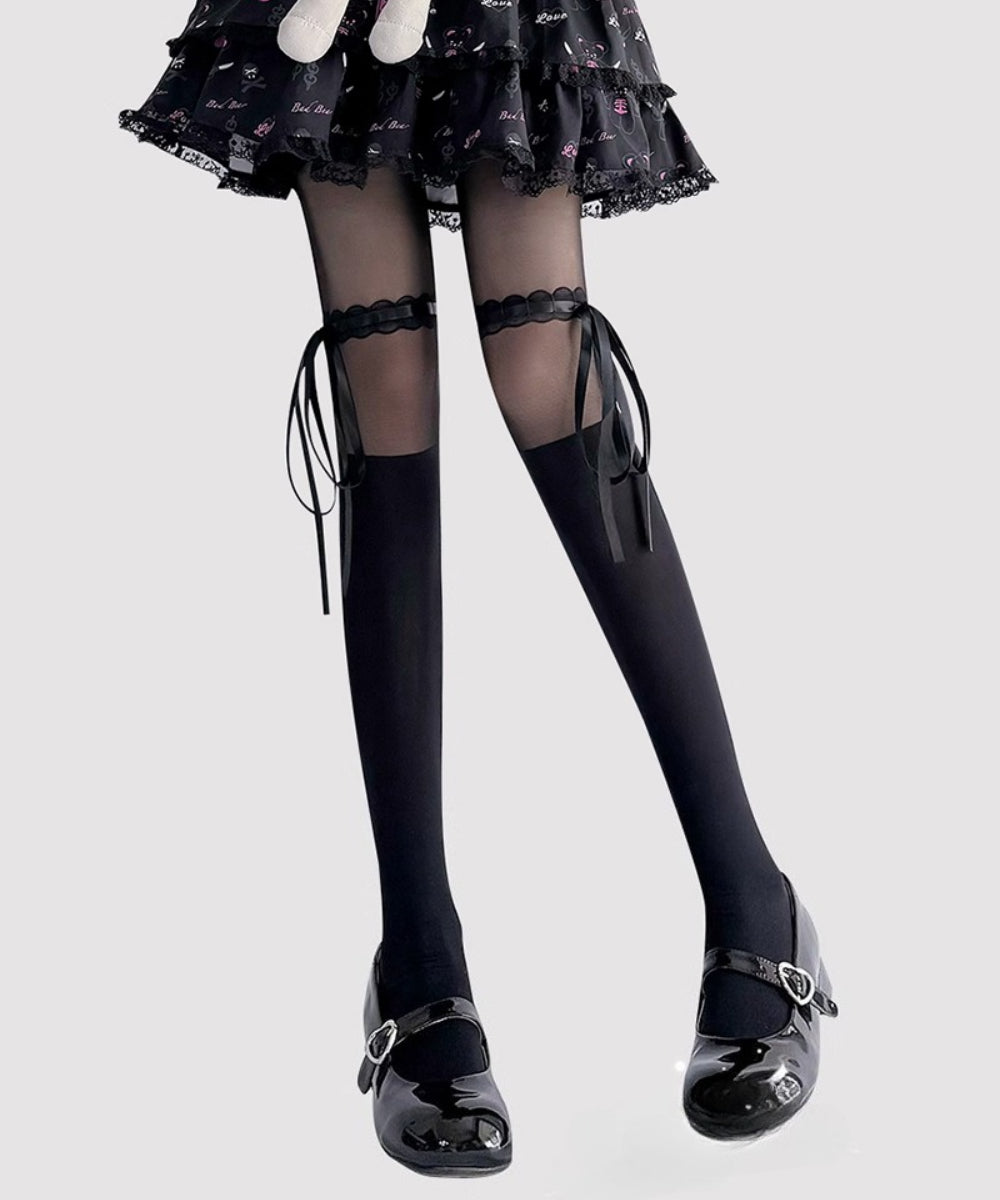 These Lolita-style tights are crafted in classic black and ivory, featuring delicate lace trims and charming bow accents. The sheer, ballet-inspired design adds a soft, elegant touch to any outfit, perfectly complementing Sweet Lolita dresses and skirts. Comfortable and lightweight, they are ideal for daily wear, tea parties, or special Lolita gatherings, enhancing the overall princess-like aesthetic of your ensemble.