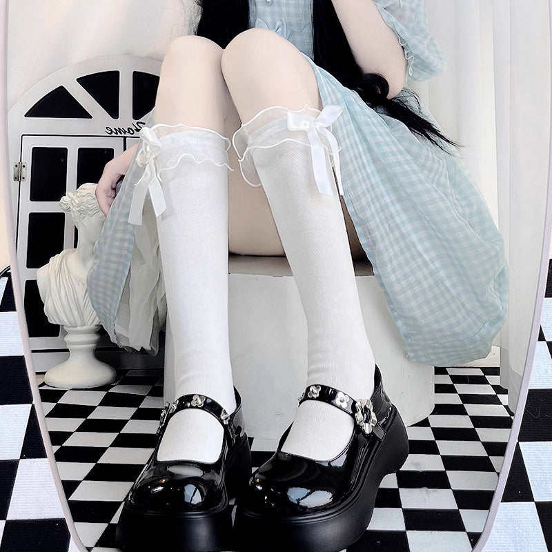 Design Concept:
These Lolita-style knee-high stockings are crafted from soft, breathable cotton, providing all-day comfort for daily wear or special occasions. Available in milk white and black, each pair is adorned with delicate lace trim and a cute bow accent, adding a charming, feminine touch to your outfit. Perfect for pairing with skirts, dresses, or Lolita ensembles to enhance a sweet, elegant aesthetic.