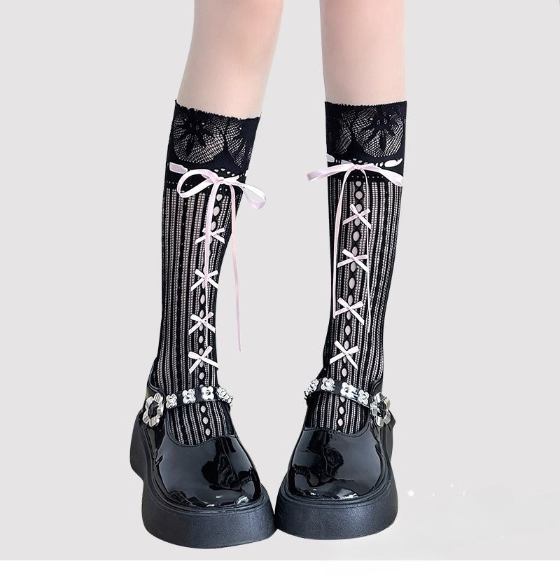 Inspired by the delicate elegance of ballet and vintage Lolita fashion, these mid-calf socks blend romance with playful charm. Sheer cream fabric adorned with intricate lace and a dainty bow tie detail creates a soft, feminine aesthetic. Perfect for pairing with Mary Jane shoes, they capture the timeless innocence of balletcore style while offering lightweight comfort for summer wear.