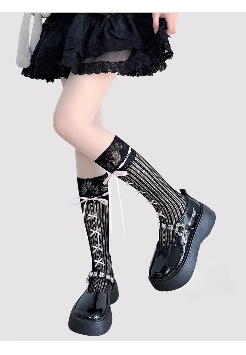 Inspired by the delicate elegance of ballet and vintage Lolita fashion, these mid-calf socks blend romance with playful charm. Sheer cream fabric adorned with intricate lace and a dainty bow tie detail creates a soft, feminine aesthetic. Perfect for pairing with Mary Jane shoes, they capture the timeless innocence of balletcore style while offering lightweight comfort for summer wear.