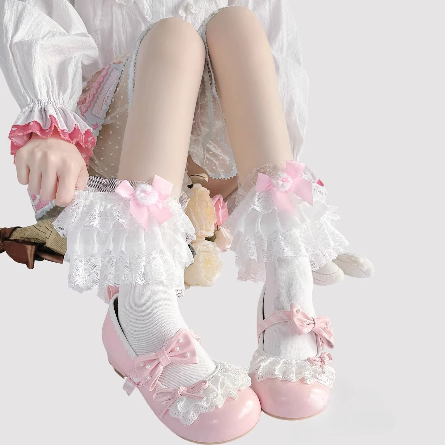Step into a world of sweet elegance with these multi-color Lolita knee-high socks. Crafted from soft, breathable cotton, each pair features delicate lace trim along the top and charming bow accents, adding a playful yet refined touch to your outfit. Perfect for pairing with Lolita dresses, skirts, or school-style JK ensembles, these socks bring a cute and whimsical element to daily wear, tea parties, or special gatherings. Comfortable and versatile, they are an essential accessory for any Lolita fashion ent