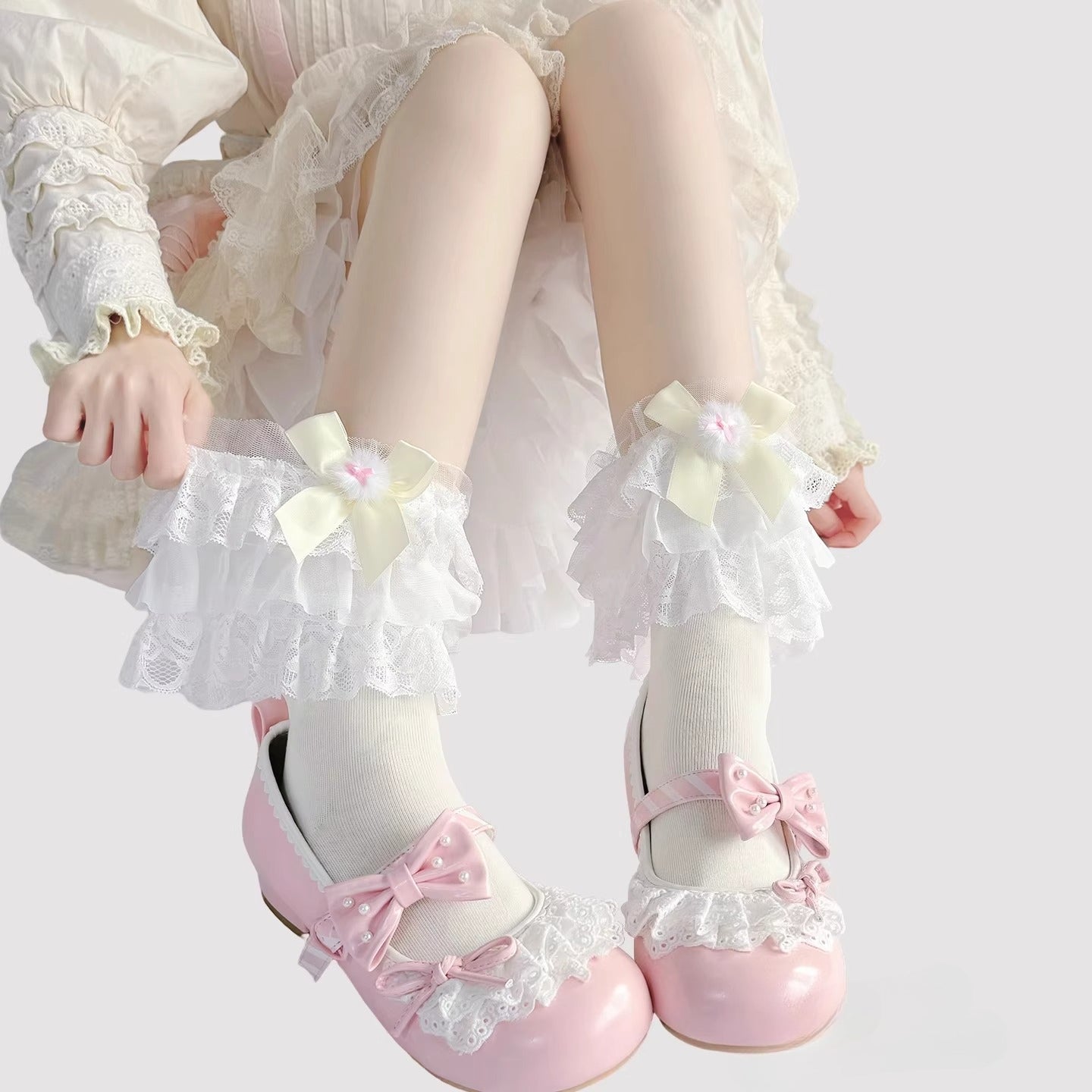 Step into a world of sweet elegance with these multi-color Lolita knee-high socks. Crafted from soft, breathable cotton, each pair features delicate lace trim along the top and charming bow accents, adding a playful yet refined touch to your outfit. Perfect for pairing with Lolita dresses, skirts, or school-style JK ensembles, these socks bring a cute and whimsical element to daily wear, tea parties, or special gatherings. Comfortable and versatile, they are an essential accessory for any Lolita fashion ent
