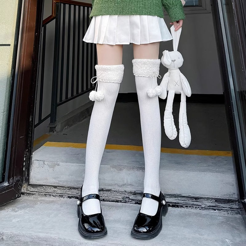 Design Concept:
Step into a world of cozy elegance with our Lolita Stockings Japanese Style Sherpa Over-The-Knee Socks. Meticulously crafted from premium pure cotton, these thigh-high wonders combine timeless Japanese aesthetic with luxurious comfort. The plush Sherpa fleece lining embraces your legs in cloud-like softness, providing exceptional warmth during chilly days while maintaining breathability for all-day wear.