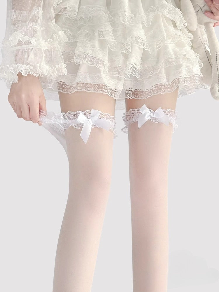Design Concept:
These Lolita-style over-the-knee stockings are crafted in sheer black and white fabric, featuring delicate bow accents at the top for a playful yet elegant touch. The semi-transparent material adds a subtle allure while maintaining a sweet Lolita aesthetic, making them perfect for daily wear, tea parties, or special occasions. The soft stretch ensures a comfortable fit that stays in place all day.