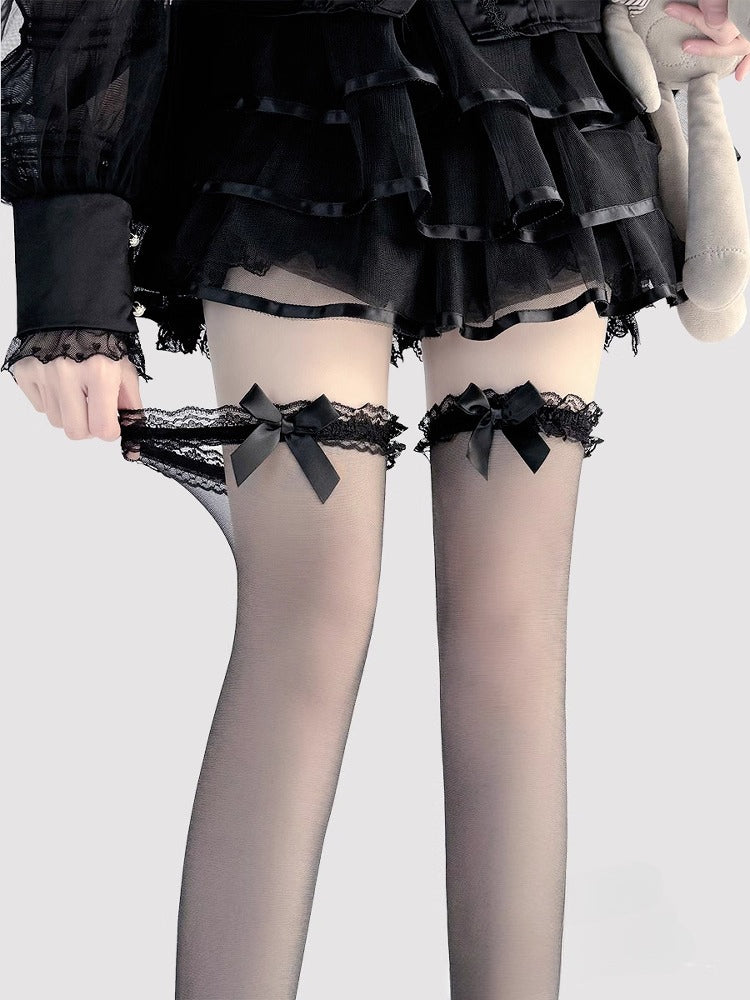 Design Concept:
These Lolita-style over-the-knee stockings are crafted in sheer black and white fabric, featuring delicate bow accents at the top for a playful yet elegant touch. The semi-transparent material adds a subtle allure while maintaining a sweet Lolita aesthetic, making them perfect for daily wear, tea parties, or special occasions. The soft stretch ensures a comfortable fit that stays in place all day.