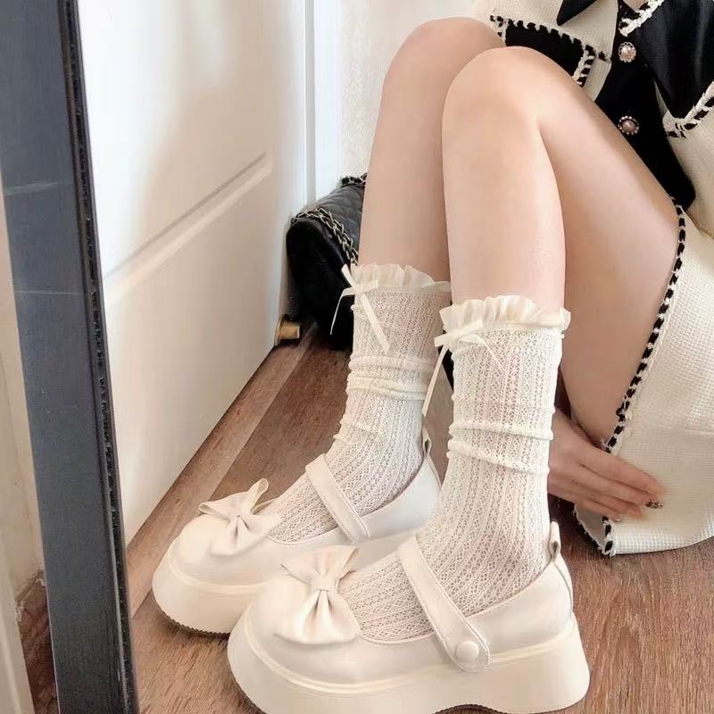 Design Concept:
These Lolita mid-calf socks in black and ivory combine playful elegance with charming detailing. Crafted from soft, breathable fabric, they feature delicate lace trim and adorable bow accents, adding a sweet, feminine touch to any Lolita ensemble. Perfect for daily wear, tea parties, or completing a layered Lolita look, these socks bring both comfort and style to your outfit.