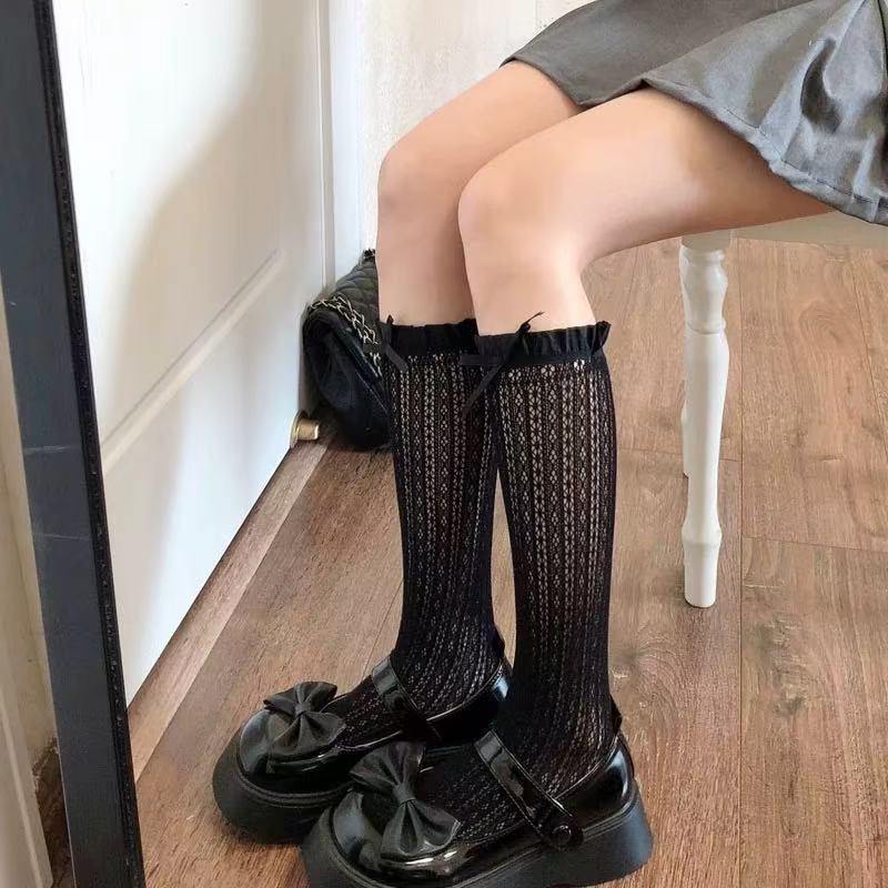Design Concept:
These Lolita mid-calf socks in black and ivory combine playful elegance with charming detailing. Crafted from soft, breathable fabric, they feature delicate lace trim and adorable bow accents, adding a sweet, feminine touch to any Lolita ensemble. Perfect for daily wear, tea parties, or completing a layered Lolita look, these socks bring both comfort and style to your outfit.