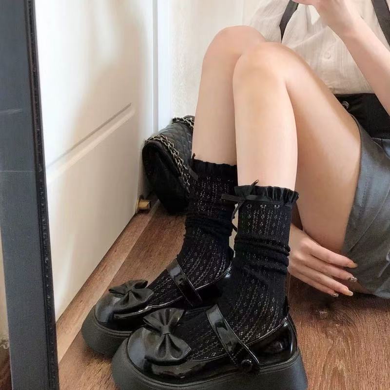 Design Concept:
These Lolita mid-calf socks in black and ivory combine playful elegance with charming detailing. Crafted from soft, breathable fabric, they feature delicate lace trim and adorable bow accents, adding a sweet, feminine touch to any Lolita ensemble. Perfect for daily wear, tea parties, or completing a layered Lolita look, these socks bring both comfort and style to your outfit.