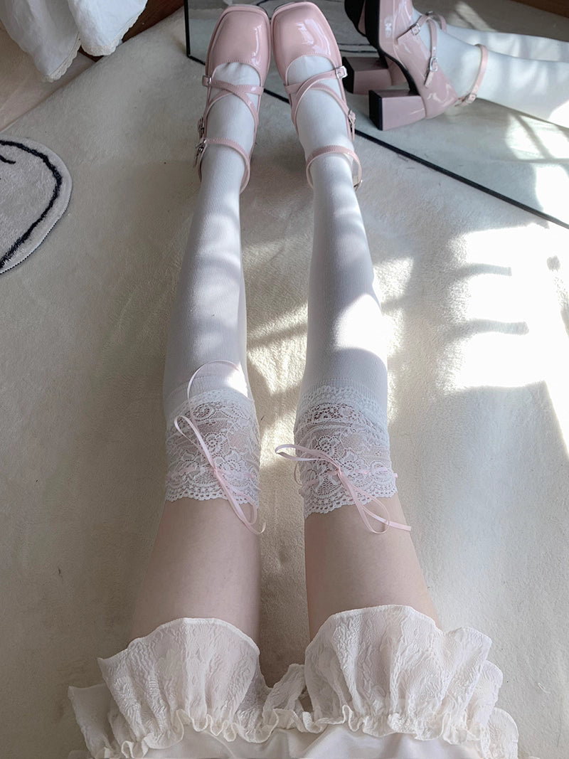 Inspired by Japanese Lolita fashion, these thigh high socks combine playful elegance with delicate charm. Featuring intricate lace trim and a cute bow ribbon tie detail, they create a sweet yet sophisticated statement piece. Designed to elevate any outfit with kawaii elegance, these socks capture the romantic essence of Harajuku street style while offering comfortable wear for daily fashion expression.