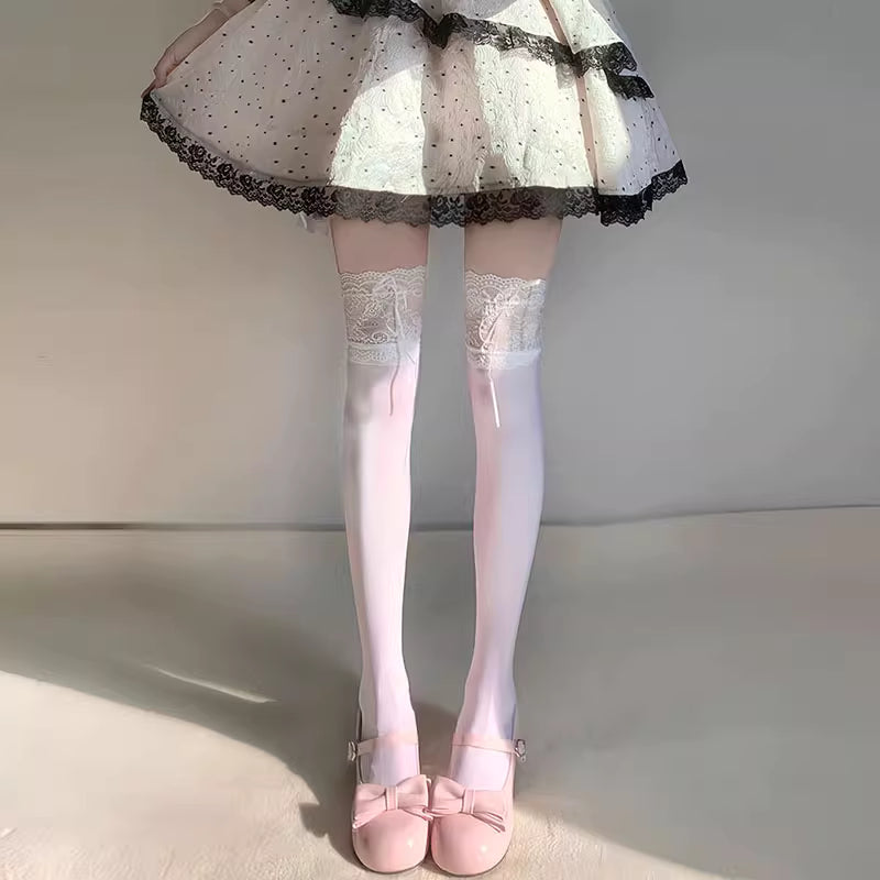 Inspired by Japanese Lolita fashion, these thigh high socks combine playful elegance with delicate charm. Featuring intricate lace trim and a cute bow ribbon tie detail, they create a sweet yet sophisticated statement piece. Designed to elevate any outfit with kawaii elegance, these socks capture the romantic essence of Harajuku street style while offering comfortable wear for daily fashion expression.