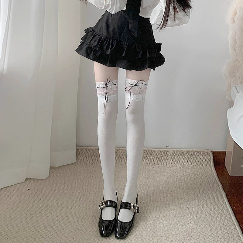 Inspired by Japanese Lolita fashion, these thigh high socks combine playful elegance with delicate charm. Featuring intricate lace trim and a cute bow ribbon tie detail, they create a sweet yet sophisticated statement piece. Designed to elevate any outfit with kawaii elegance, these socks capture the romantic essence of Harajuku street style while offering comfortable wear for daily fashion expression.