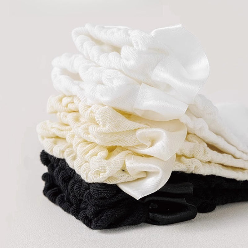 Design Concept:
These Lolita stockings are crafted in soft, comfortable fabric, available in white, black, and ivory. Designed for mid-calf length wear, they feature delicate lace trim and charming ruffle details that add a sweet, elegant touch to any outfit. Adorned with cute bow accents, these stockings perfectly complement Lolita dresses and skirts, making them ideal for daily wear, tea parties, or special gatherings. The lace and bow details enhance the overall princess-like aesthetic, creating a refin