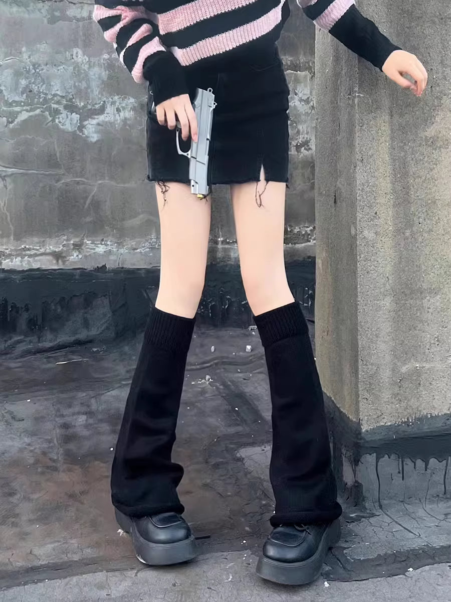 Inspired by the bold fusion of Y2K aesthetics and Japanese street style, these flared leg warmers redefine cozy fashion. The bell-shaped design and soft knit fabric combine retro glamour with Lolita sweetness, while the stacked mid-calf fit offers both warmth and a striking silhouette. Perfect for adding a playful yet edgy statement to any outfit, blending millennial nostalgia with contemporary cuteness.