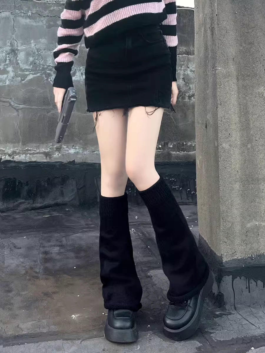 Inspired by the bold fusion of Y2K aesthetics and Japanese street style, these flared leg warmers redefine cozy fashion. The bell-shaped design and soft knit fabric combine retro glamour with Lolita sweetness, while the stacked mid-calf fit offers both warmth and a striking silhouette. Perfect for adding a playful yet edgy statement to any outfit, blending millennial nostalgia with contemporary cuteness.