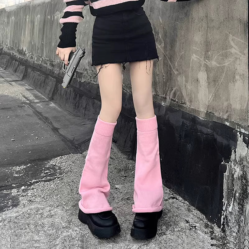 Inspired by the bold fusion of Y2K aesthetics and Japanese street style, these flared leg warmers redefine cozy fashion. The bell-shaped design and soft knit fabric combine retro glamour with Lolita sweetness, while the stacked mid-calf fit offers both warmth and a striking silhouette. Perfect for adding a playful yet edgy statement to any outfit, blending millennial nostalgia with contemporary cuteness.