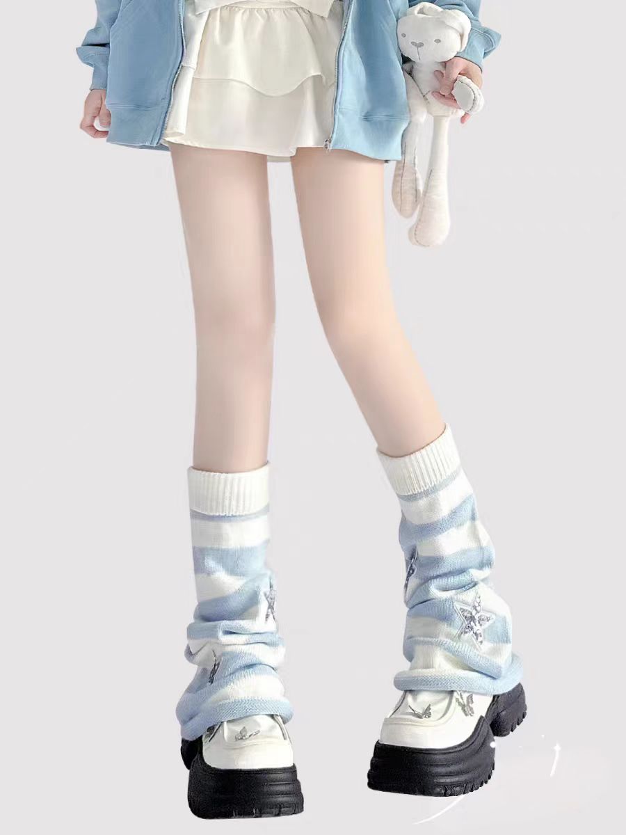 Inspired by the vibrant energy of Y2K subculture, these leg warmers blend nostalgic retro charm with playful Lolita aesthetics. Featuring bold pink and blue stripes, whimsical star and pearl details, and soft knit texture, they add a touch of rebellious cuteness to any outfit. Perfect for expressing unique street-style personality while staying cozy and fashion-forward.