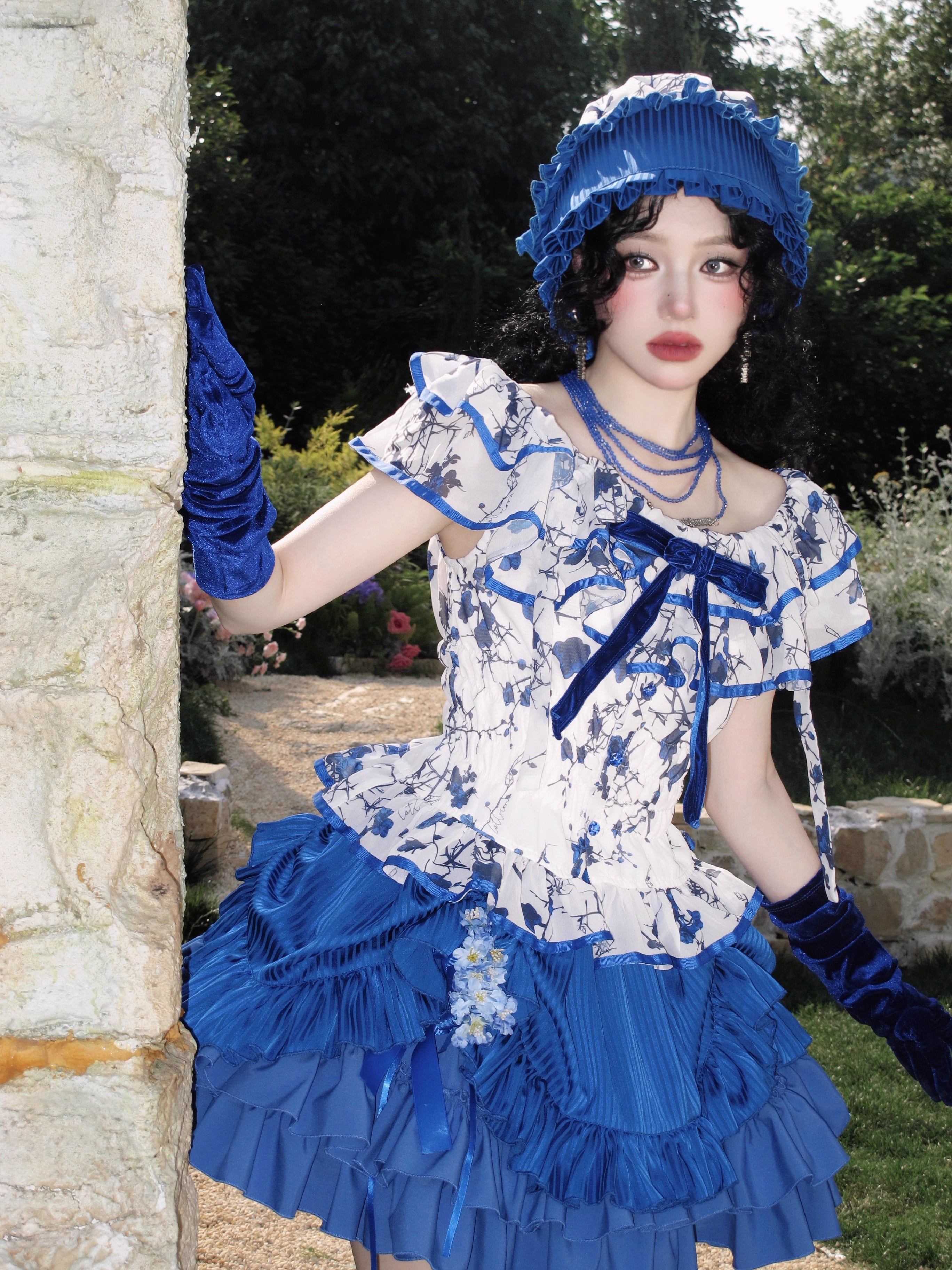 This Halloween Blue Gothic Lolita Set blends dark elegance with a playful festive twist. Featuring a classic shirt paired with a short skirt, the design highlights Gothic-inspired details while keeping a youthful Lolita silhouette. The deep blue tone adds mystery and charm, making it a unique choice for Halloween parties, cosplay, or themed gatherings. Stylish yet versatile, this set perfectly captures the balance of Gothic drama and Lolita sweetness.