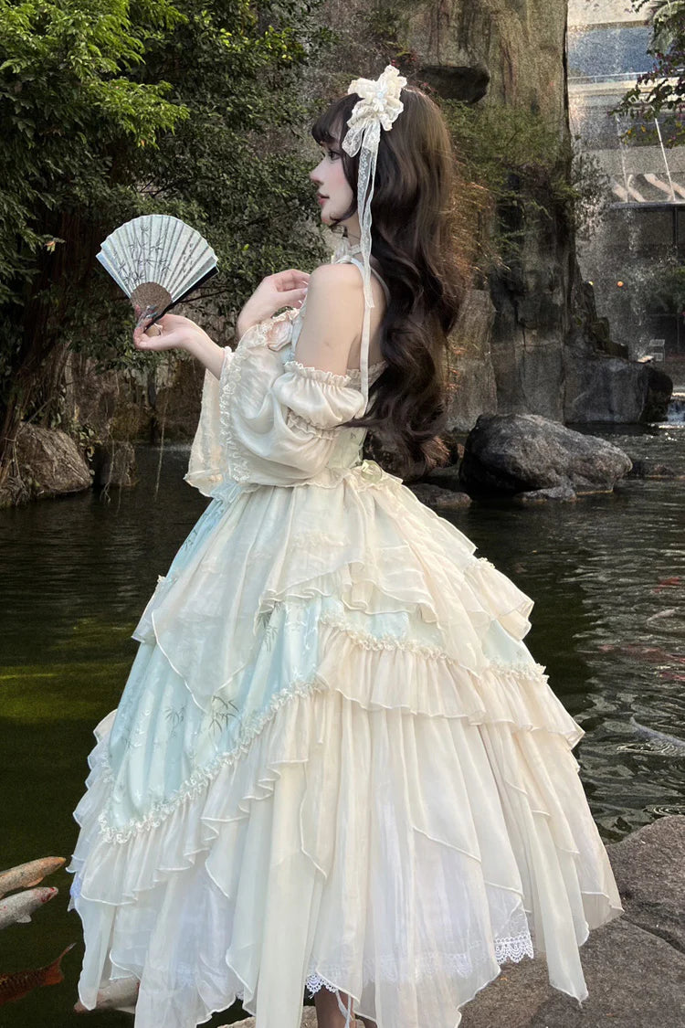 This Green Chinese Style Ballet Lolita JSK Dress Set combines traditional elegance with sweet Lolita charm. The jacquard fabric enhances its refined texture, while ruffles, lace, and bowknot details create a romantic silhouette. The irregular long hemline adds graceful movement, echoing the elegance of ballet-inspired design. With a sleeveless cut for versatility, this dress set is perfect for cultural gatherings, photoshoots, or special occasions, blending Chinese-inspired aesthetics with timeless Lolita b