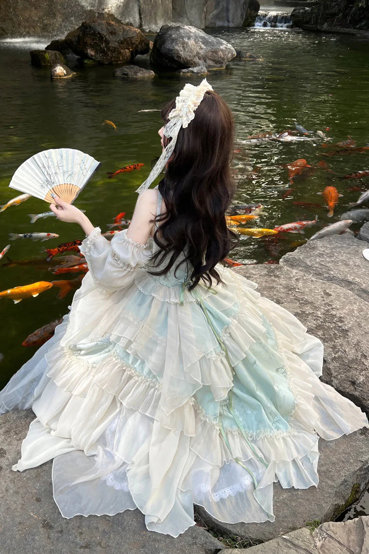 This Green Chinese Style Ballet Lolita JSK Dress Set combines traditional elegance with sweet Lolita charm. The jacquard fabric enhances its refined texture, while ruffles, lace, and bowknot details create a romantic silhouette. The irregular long hemline adds graceful movement, echoing the elegance of ballet-inspired design. With a sleeveless cut for versatility, this dress set is perfect for cultural gatherings, photoshoots, or special occasions, blending Chinese-inspired aesthetics with timeless Lolita b