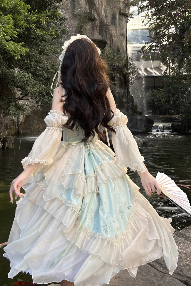 This Green Chinese Style Ballet Lolita JSK Dress Set combines traditional elegance with sweet Lolita charm. The jacquard fabric enhances its refined texture, while ruffles, lace, and bowknot details create a romantic silhouette. The irregular long hemline adds graceful movement, echoing the elegance of ballet-inspired design. With a sleeveless cut for versatility, this dress set is perfect for cultural gatherings, photoshoots, or special occasions, blending Chinese-inspired aesthetics with timeless Lolita b