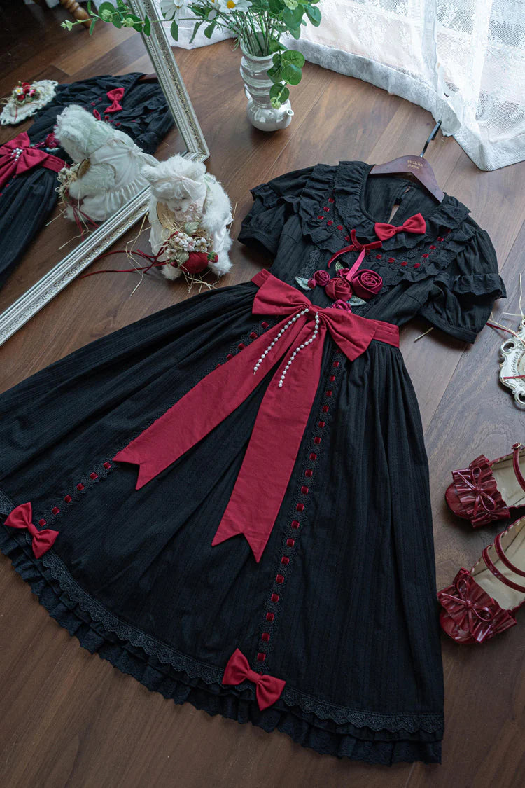 This collection offers two timeless interpretations of Lolita elegance: the profound mystery of classic black and the pristine sweetness of pearl white. Both versions feature the same meticulous design—playful short sleeves, cascading ruffles, and satin bow accents—allowing wearers to choose a hue that reflects their unique style narrative. Whether embodying poetic darkness or luminous innocence, each dress celebrates the harmonious balance between tradition and fantasy.
