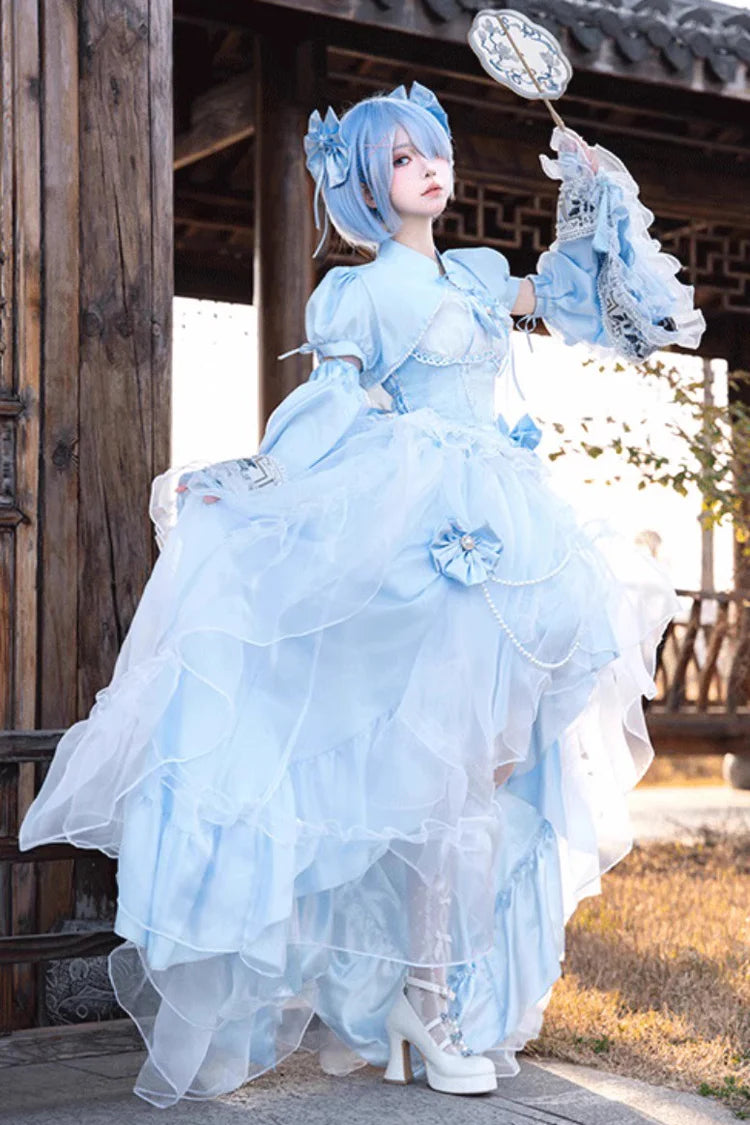 The Blue Hanayome Short JSK Dress is crafted to highlight inclusivity and timeless Lolita elegance. Featuring a sleeveless cut, layered ruffles, and delicate lace, it creates a light, graceful silhouette perfect for warm seasons. The bowknot accents add sweetness, while the Hanayome-inspired design brings a touch of romantic refinement. Specially designed for plus-size wearers, it combines comfort, beauty, and versatility, making it ideal for tea parties, gatherings, and special occasions.