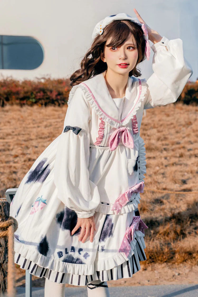 The Cow Print Sweet Lolita Dress combines playful charm with classic elegance. Featuring a doll collar and lantern sleeves, it creates a vintage-inspired silhouette, while the ruffled details and bowknot accents add sweetness. The unique cow print stitching introduces a fun, eye-catching twist that balances cuteness with individuality. Perfect for casual outings, themed events, or tea parties, this dress reflects the whimsical, versatile spirit of Lolita fashion.