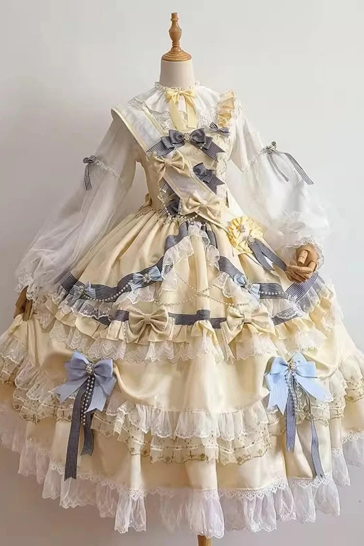 "Inspired by the opulence of royal courts and the delicate beauty of gilded artistry, this dress transforms classic Lolita elegance into a vision of luxury. The gold-toned palette evokes a sense of grandeur, while intricate lace and cascading ruffles reflect both tradition and fantasy."