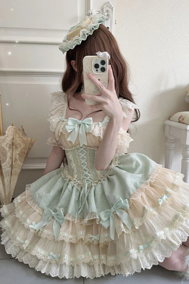 The Green Ballet Lolita JSK Dress is designed to express freshness and elegance with a sweet, playful twist. Featuring double-layered ruffles, delicate lace trim, and charming bow accents, it creates a graceful silhouette inspired by ballet costumes. The lace-up design adds adjustability and refinement, ensuring comfort along with beauty. In a lively green tone, this dress is perfect for tea parties, gatherings, or special occasions, embodying the whimsical spirit of Sweet Lolita fashion.