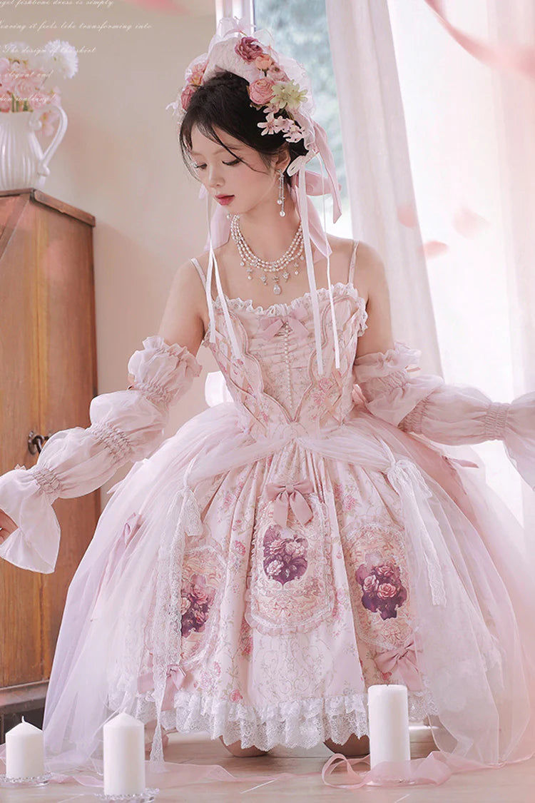 Inspired by a blooming garden at dawn, this JSK captures the delicate balance between youthful sweetness and refined grace. Soft floral prints dance across layers of lace and ruffles, while satin bows and intricate embroidery add a touch of royal fantasy. Designed to evoke the romance of a fairy tale, it invites the wearer to embrace both playful charm and timeless elegance—where every detail whispers a story of beauty and dreams.