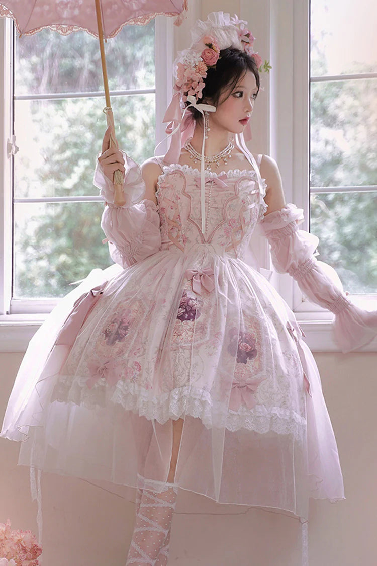 Inspired by a blooming garden at dawn, this JSK captures the delicate balance between youthful sweetness and refined grace. Soft floral prints dance across layers of lace and ruffles, while satin bows and intricate embroidery add a touch of royal fantasy. Designed to evoke the romance of a fairy tale, it invites the wearer to embrace both playful charm and timeless elegance—where every detail whispers a story of beauty and dreams.
