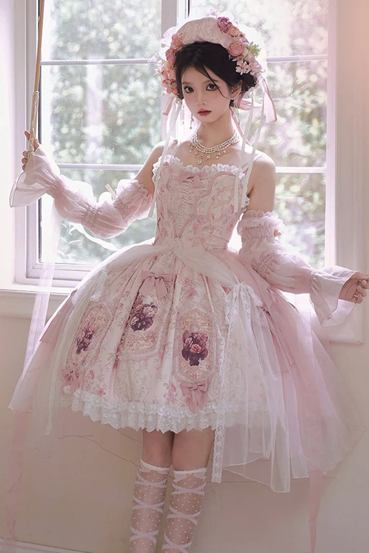 Inspired by a blooming garden at dawn, this JSK captures the delicate balance between youthful sweetness and refined grace. Soft floral prints dance across layers of lace and ruffles, while satin bows and intricate embroidery add a touch of royal fantasy. Designed to evoke the romance of a fairy tale, it invites the wearer to embrace both playful charm and timeless elegance—where every detail whispers a story of beauty and dreams.