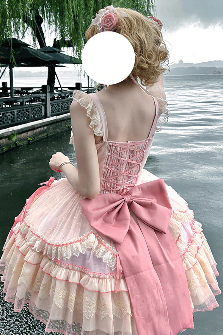 The Pink Sleeveless JSK Dress is designed to embody the dreamy charm of Sweet Lolita fashion. Featuring layered ruffles, delicate lace trim, and graceful bow accents, it creates a romantic and youthful silhouette. The lace-up detail adds both adjustability and elegance, ensuring a flattering fit. In a soft pink hue, this dress radiates sweetness and femininity, making it perfect for tea parties, gatherings, or special occasions where timeless Lolita beauty shines.