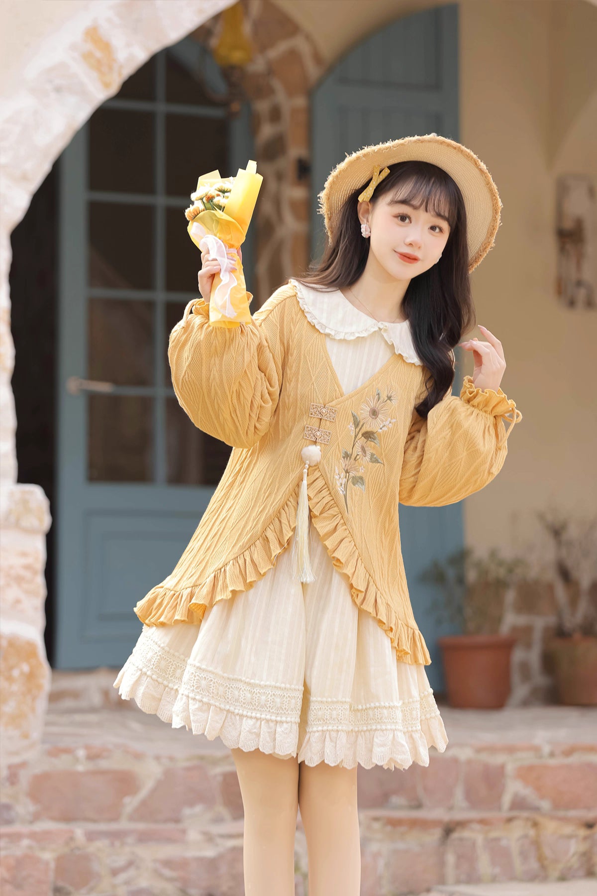 This Yellow Sweet Lolita Dress Set combines warmth, comfort, and playful charm. Featuring vibrant sunflower embroidery, it brings a cheerful, pastoral touch to the classic Lolita silhouette. The long-sleeve coat adds layering and coziness, perfectly complementing the JSK dress beneath. Ideal for tea parties, seasonal outings, or casual gatherings, this set captures a bright and youthful Lolita aesthetic, blending sweet elegance with a touch of countryside charm.