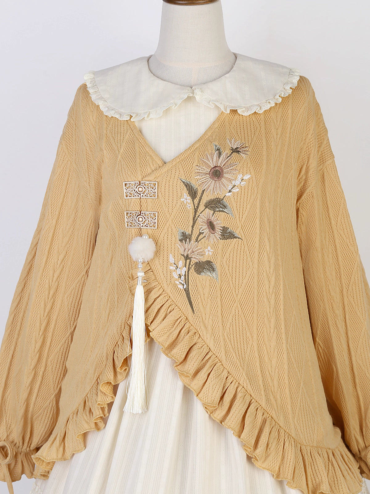 This Yellow Sweet Lolita Dress Set combines warmth, comfort, and playful charm. Featuring vibrant sunflower embroidery, it brings a cheerful, pastoral touch to the classic Lolita silhouette. The long-sleeve coat adds layering and coziness, perfectly complementing the JSK dress beneath. Ideal for tea parties, seasonal outings, or casual gatherings, this set captures a bright and youthful Lolita aesthetic, blending sweet elegance with a touch of countryside charm.