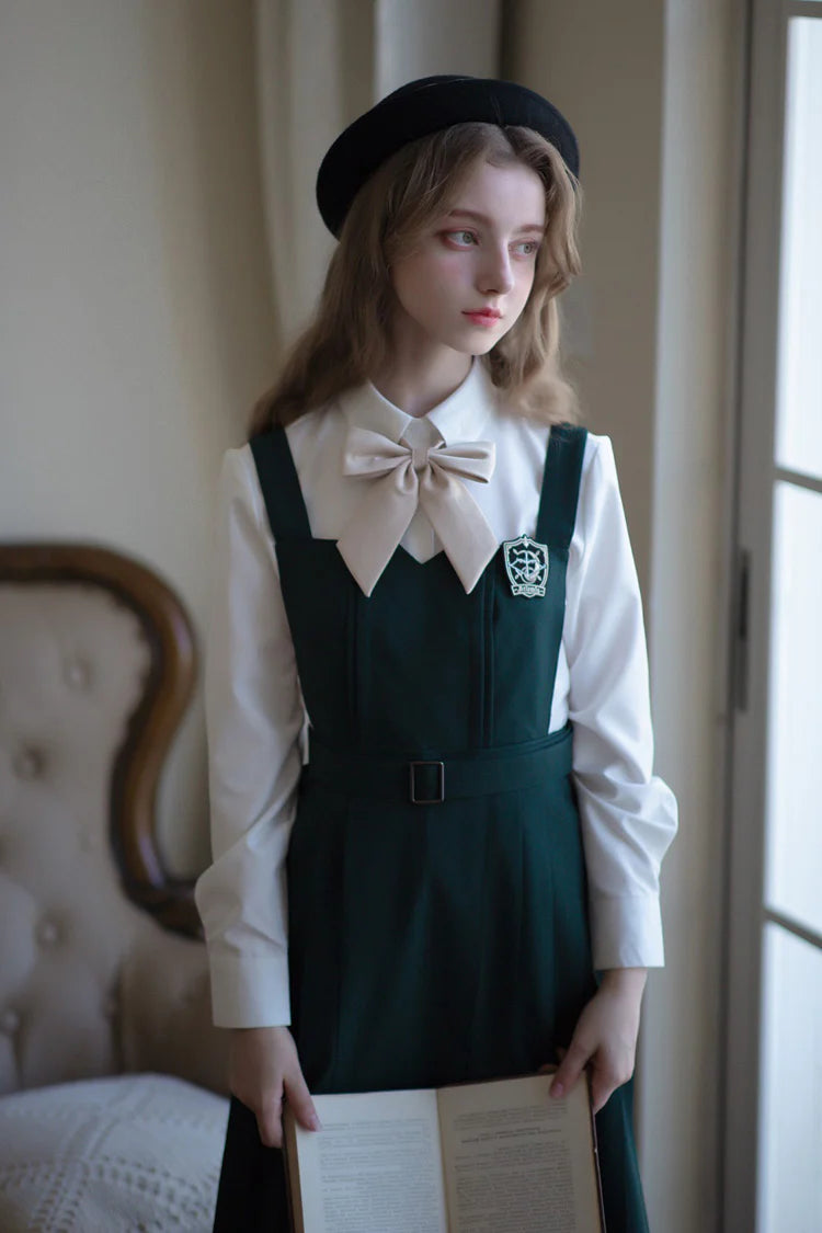 Design Concept:
This Academic Department green pullover dress set blends sweet school style with elegant Lolita elements, presenting a refined and youthful look. The design captures the charm of academic fashion while maintaining a graceful silhouette. The product includes a dress, a matching bow tie, a badge, and a chain, creating a complete coordinated outfit.