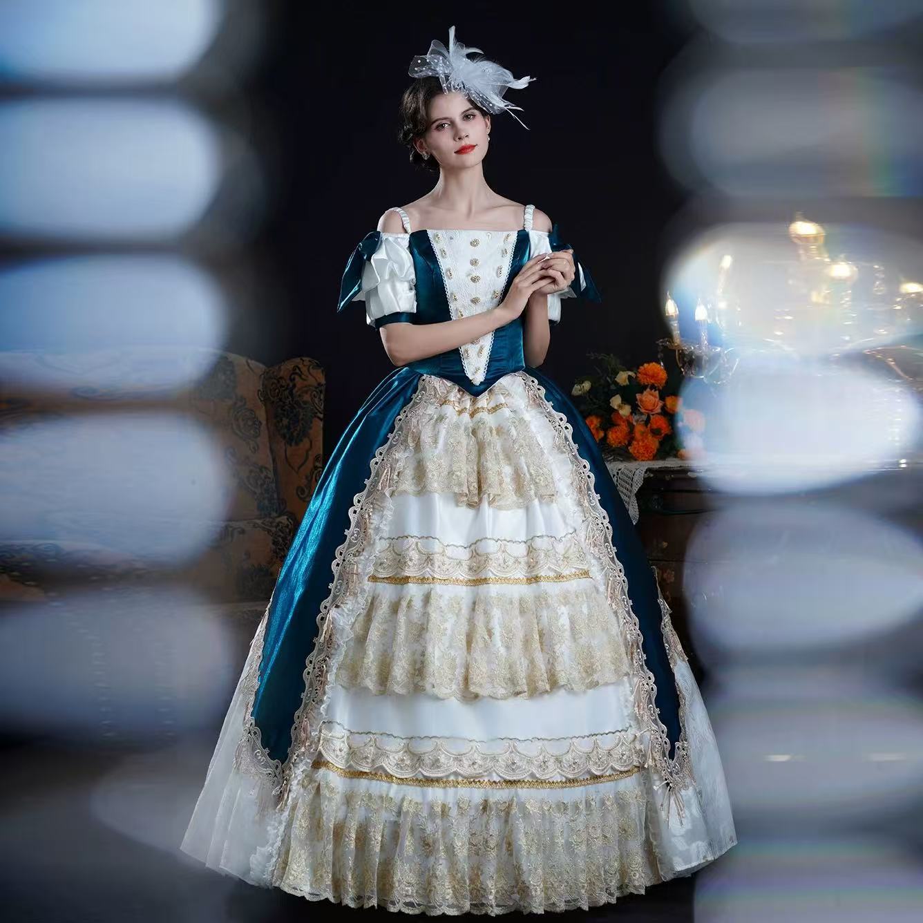 Design concept:
This Classic Lolita dress in blue and apricot features an off-shoulder design with short sleeves, layered frills, and delicate ribbon lace details. Styled with a jacket-inspired bodice, it blends princess elegance with palace and Victorian influences. Perfect for tea parties, stage performances, or formal Lolita occasions, this dress captures timeless sophistication with a romantic, regal charm.