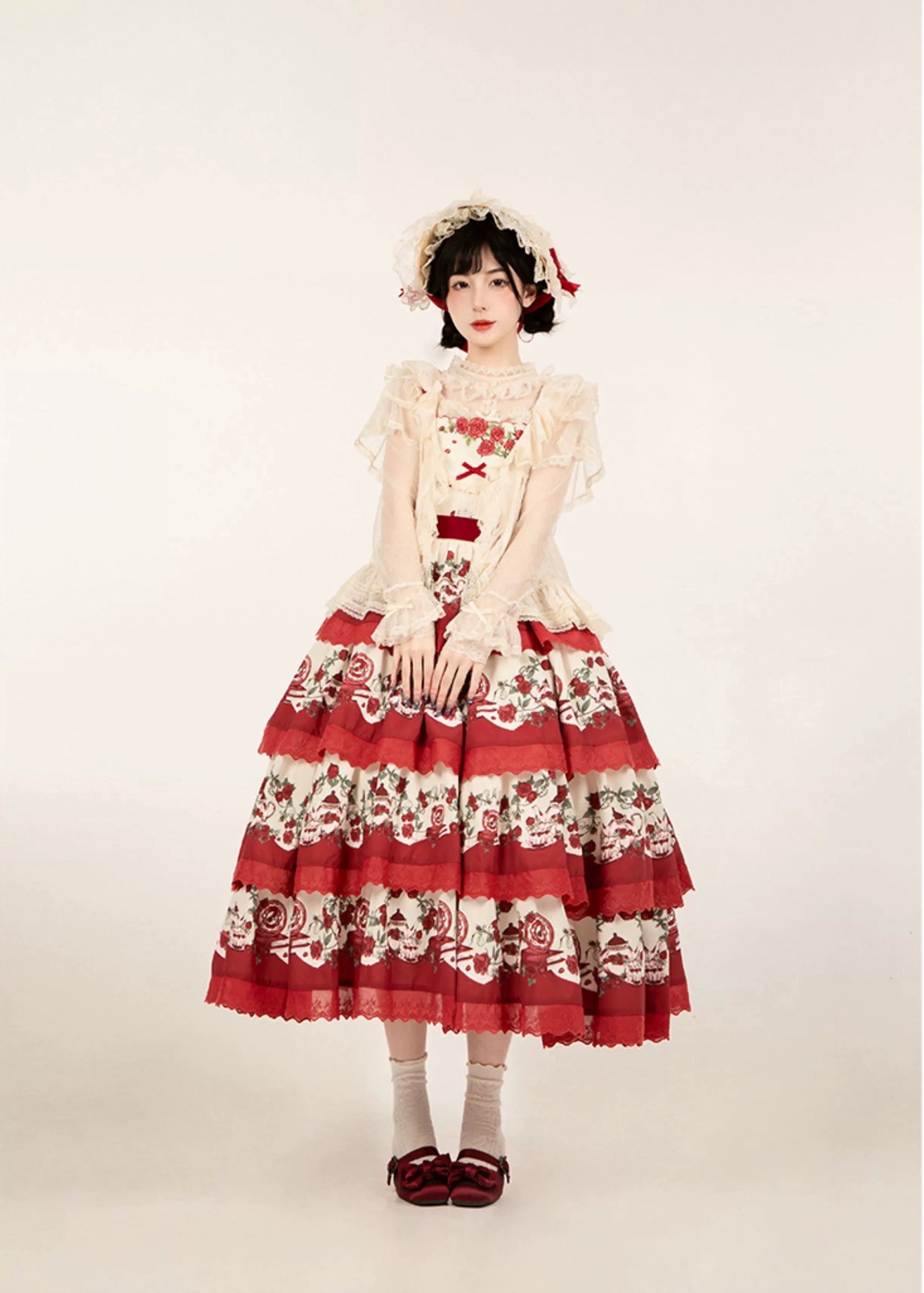 Design Concept: 
This Classic Lolita JSK dress features a pastoral print with delicate embroidery, designed in a tiered silhouette for a graceful layered effect. Available in both red and blue, it brings a charming countryside elegance with a timeless Lolita touch. The set includes the JSK and a matching belt, allowing for a refined fit and added styling versatility.