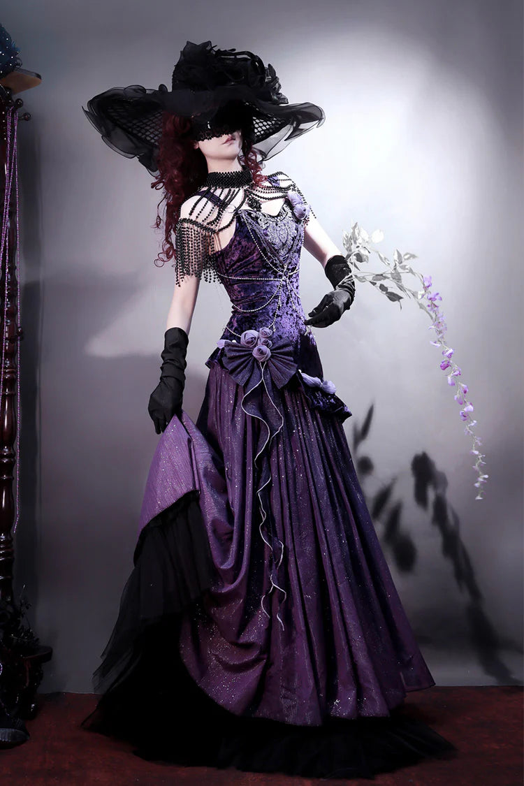 Design Concept:
This Gothic Lolita JSK dress embodies an elegant blend of sweetness and grandeur. Designed in a soft purple shade, it features layered ruffles, delicate lace trim, and graceful bow accents that highlight its princess-like charm. The flared skirt creates a voluminous silhouette, perfect for capturing the dreamy elegance of classic Lolita fashion. Whether styled with a blouse for a refined Gothic look or worn with matching accessories, this dress is ideal for tea parties, themed gatherings, o