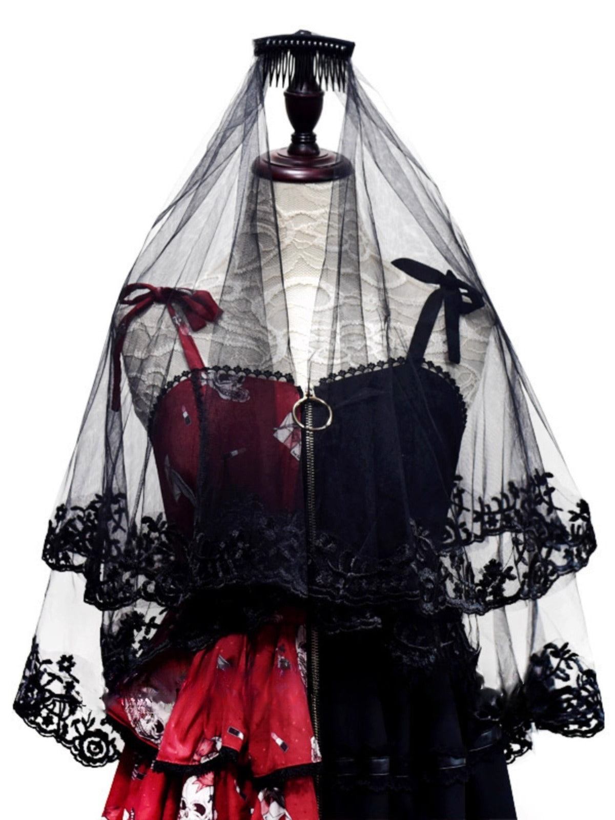 Design Concept:
This Gothic Lolita veil embodies a mysterious dark elegance with a punk-inspired twist. Crafted in deep black, the long nun-style veil flows gracefully, creating a dramatic silhouette that enhances Gothic, Punk, and Lolita aesthetics. Perfect for Halloween, cosplay, or themed photoshoots, this versatile accessory adds a hauntingly beautiful touch to any outfit, making it an essential piece for those who love bold and striking fashion statements.