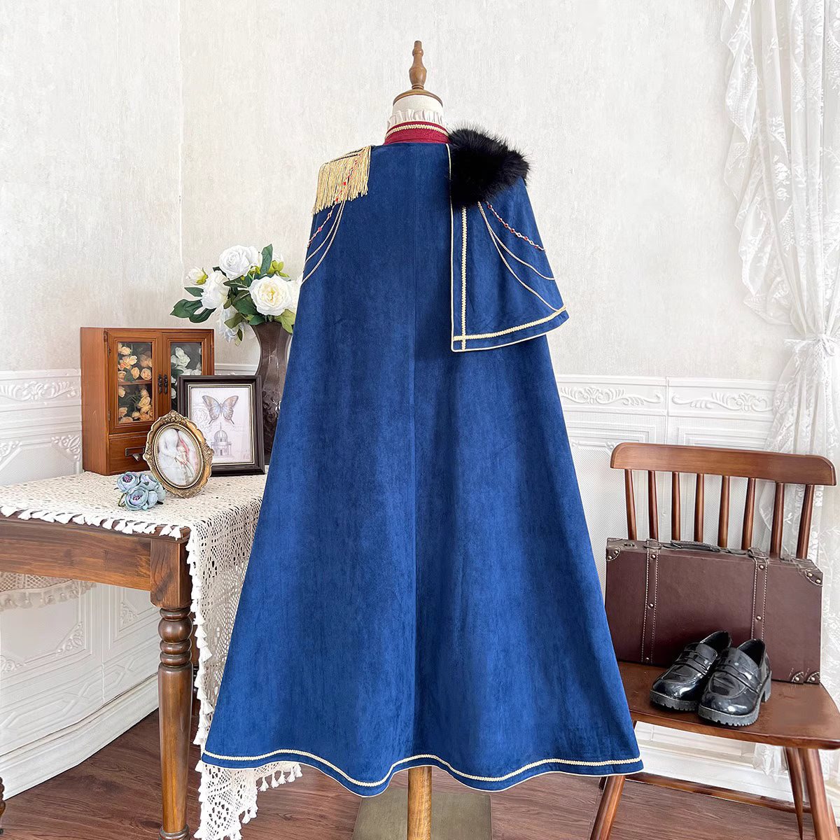 Design Concept:
Step into a world of regal elegance with this Lolita coat in deep blue, inspired by vintage European royal court fashion. Crafted with attention to detail, the coat features a structured silhouette with classic prince-style elements and a flowing cape, perfect for adding a noble touch to your Lolita or cosplay ensemble. Ideal for daily wear, tea parties, or special themed events, this coat effortlessly combines historical charm with modern Lolita aesthetics.