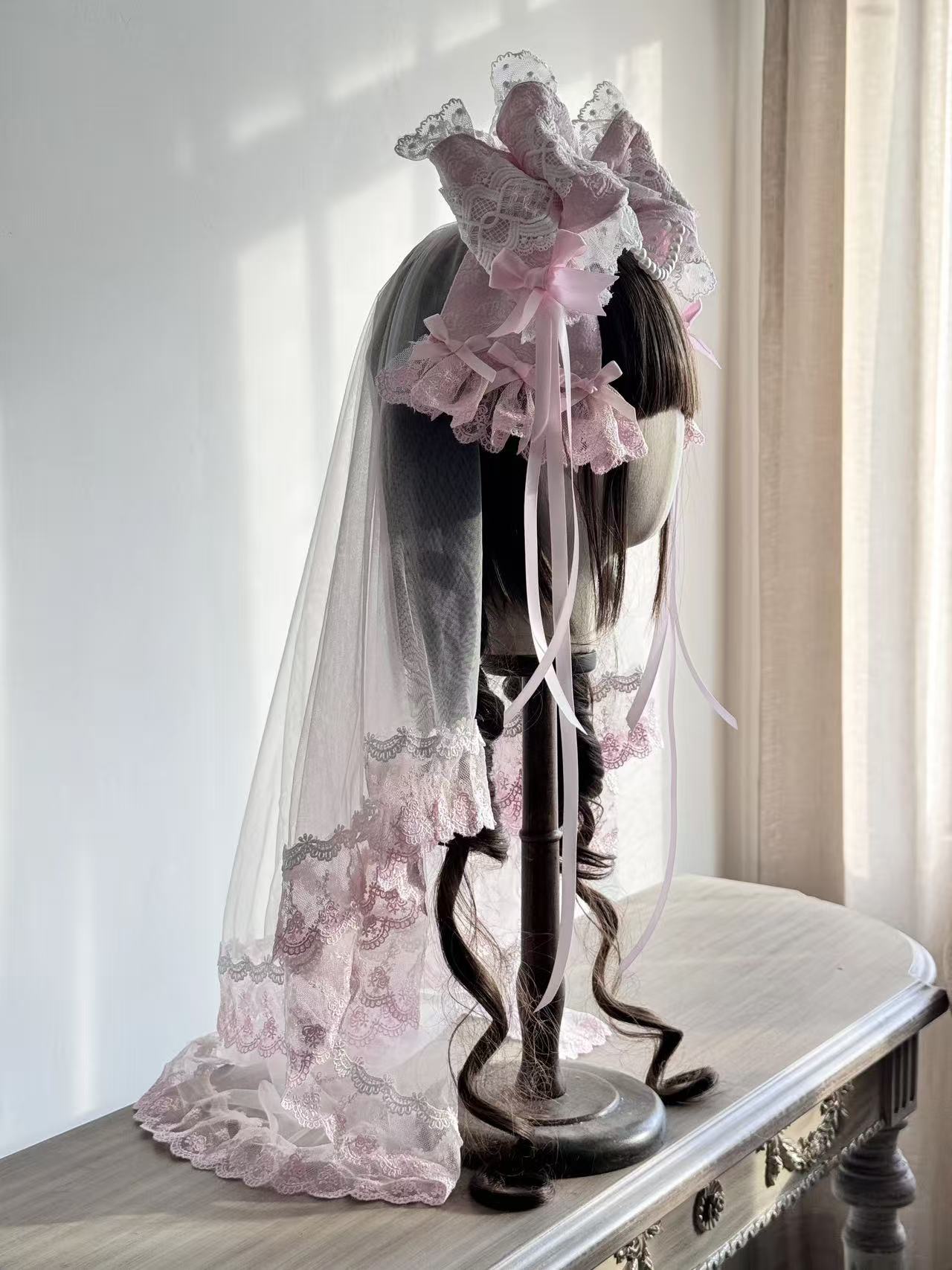 Design Concept:
This Lolita hair accessories set includes a delicate bowknot hair clip (KC) paired with a soft matching veil, creating an elegant and dreamy style. Available in three colors—white, pink, and blue—each design captures a sweet and graceful charm, making it a versatile choice for coordinating with different Lolita outfits.