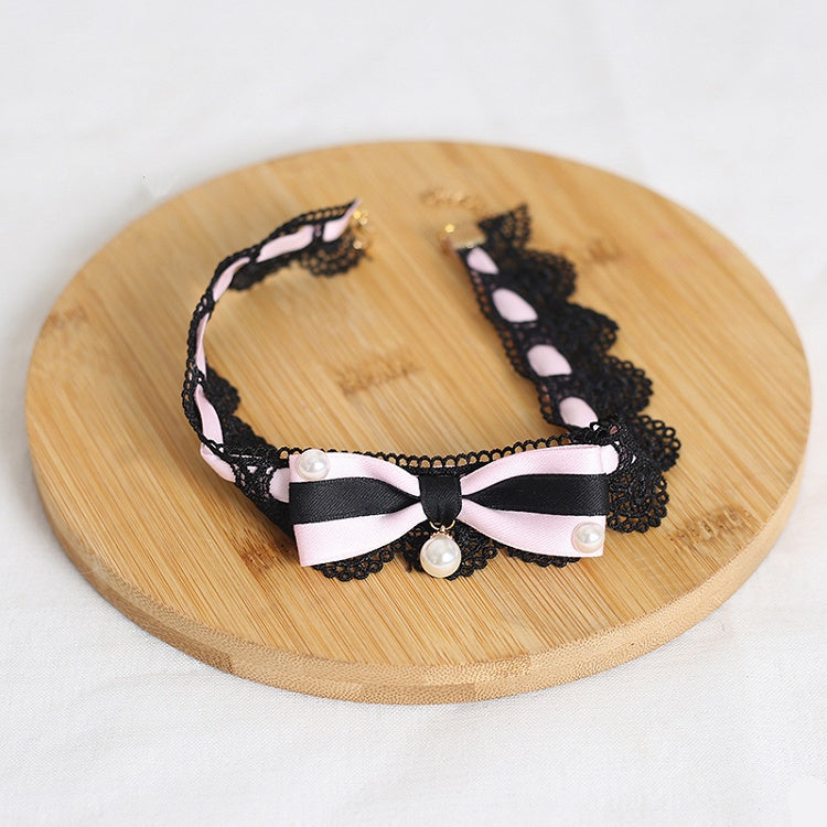 Design Concept:
This Lolita necklace collection comes in two charming variations. The dark pink version features a delicate lace choker adorned with a black heart pendant, while the light pink version is styled with a graceful pearl pendant. Both designs are accented with bow details, creating a sweet and elegant Lolita accessory perfect for completing a lovely outfit.