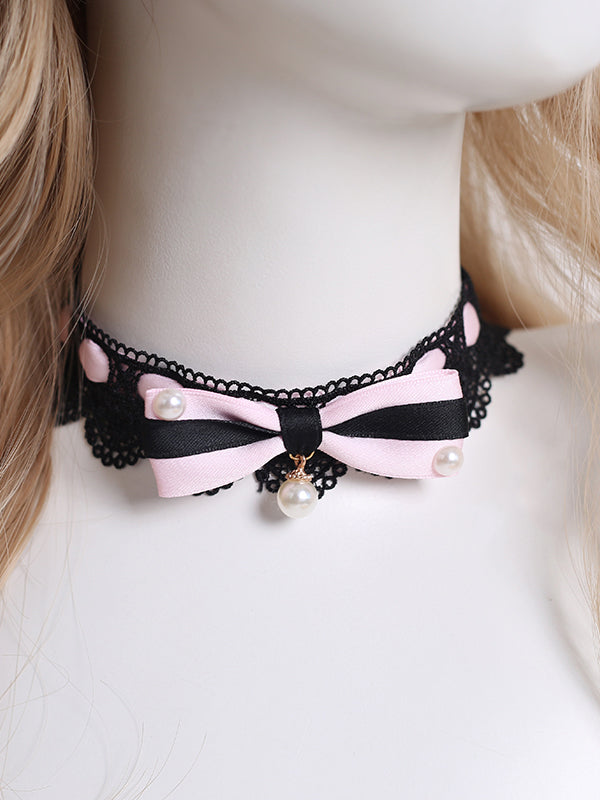 Design Concept:
This Lolita necklace collection comes in two charming variations. The dark pink version features a delicate lace choker adorned with a black heart pendant, while the light pink version is styled with a graceful pearl pendant. Both designs are accented with bow details, creating a sweet and elegant Lolita accessory perfect for completing a lovely outfit.