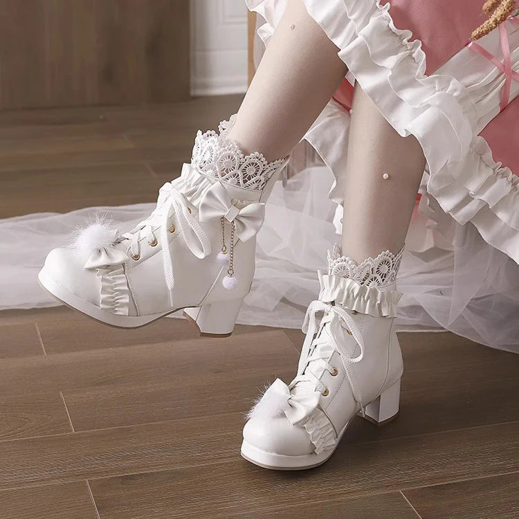 Design Concept:
These charming Lolita boots perfectly combine sweet elegance with detailed craftsmanship. Made with high-quality materials, they feature delicate embroidered lace and a playful ribbon accent on the front, creating a refined and feminine look. Designed with a comfortable mid-height heel and sturdy sole, they provide both style and support for daily wear or special occasions. Available in three enchanting colors—black, pink, and white—these boots are ideal for completing sweet, classic, or el