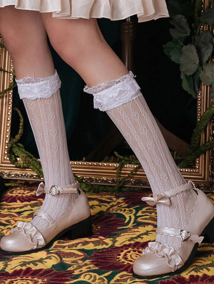 Design Concept:
These Lolita socks combine elegance with playful charm. Crafted in black or white, they feature heart-shaped lace detailing and a hollow mid-tube design, adding a delicate and whimsical touch to any outfit. The stretchy material ensures a comfortable fit while maintaining their shape, making them perfect for pairing with skirts, dresses, or cosplay ensembles. Ideal for completing sweet, romantic, or classic Lolita looks, these socks are both stylish and versatile.