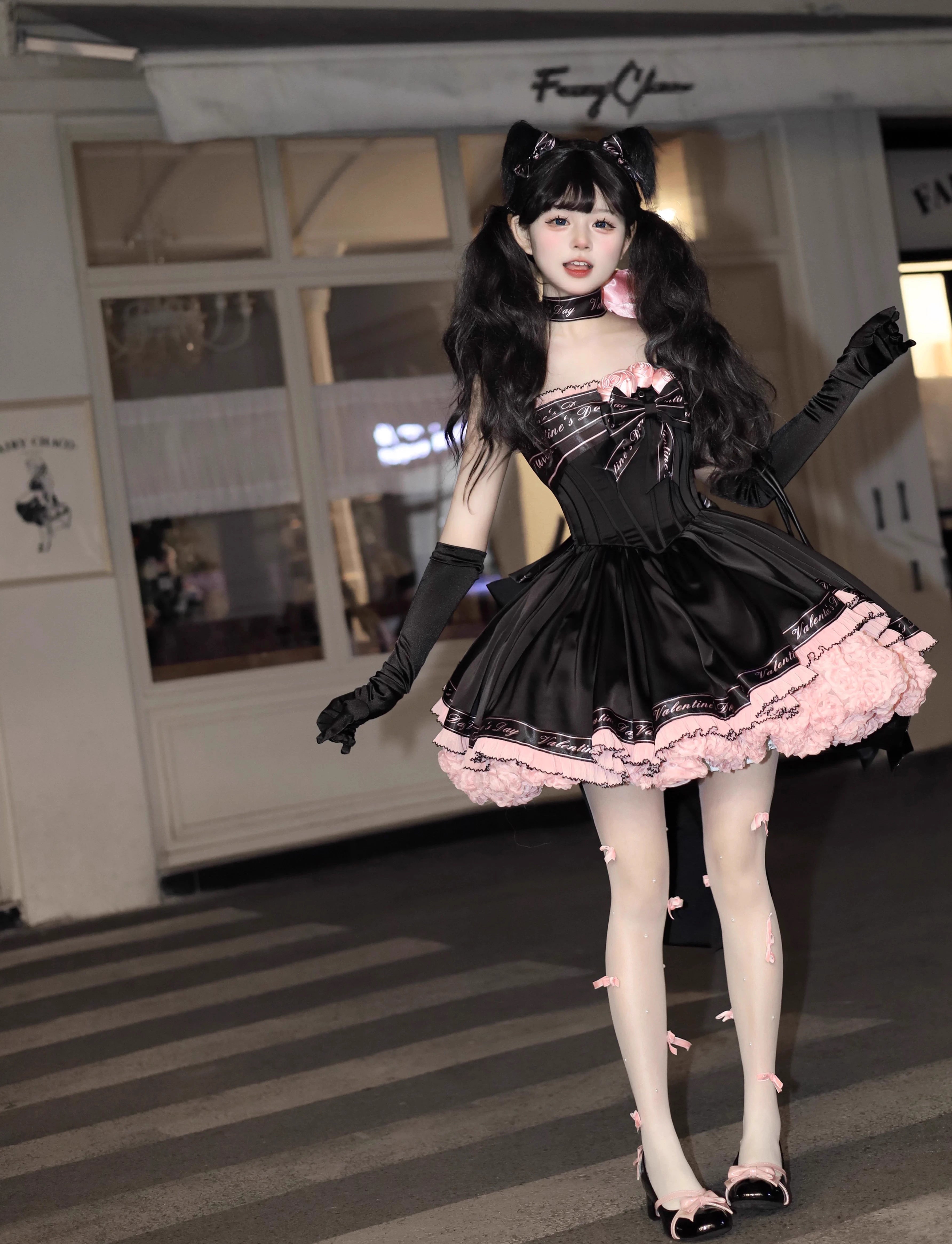 This Sweet Lolita short princess dress in black and pink combines playful charm with elegant design. Crafted from high-quality fabric, it features a fitted bodice with delicate straps, a flared skirt, and includes a petticoat for extra volume. Perfect for student events, parties, tea ceremonies, or cosplay, this dress captures a youthful yet refined aesthetic, making it a standout choice for any special occasion. The set includes both the dress and the petticoat.