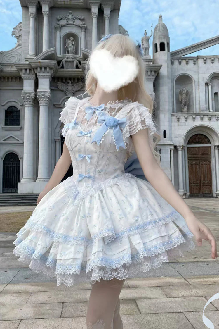 Design Concept: 
Immerse yourself in a fairy tale with this complete Sweet Lolita coord set. The set features a beautiful blue colorway with an all-over delicate floral print, perfect for creating a sweet and romantic look. The centerpiece is a Jumperskirt (JSK) dress, adorned with multi-layered ruffles, intricate lace, and a charming bow detail. The matching blouse complements the dress perfectly, creating a harmonious and fully styled silhouette.